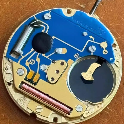 Swiss Made ETA955.412 quartz watch movement with 3 hands and black date disk at 3 o'clock.