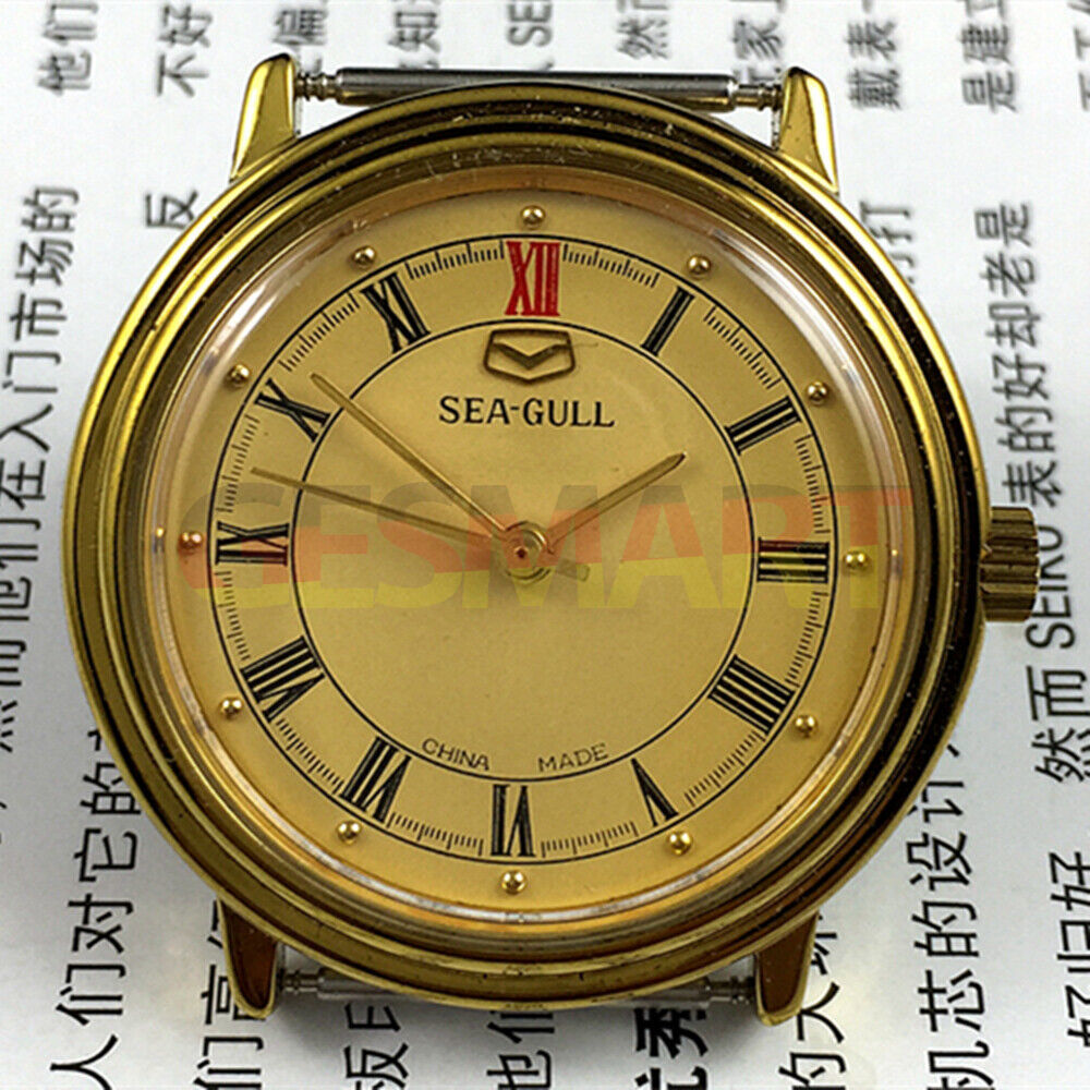 35mm round golden Tianjin Seagull watch with manual mechanical movement and elegant golden dial.