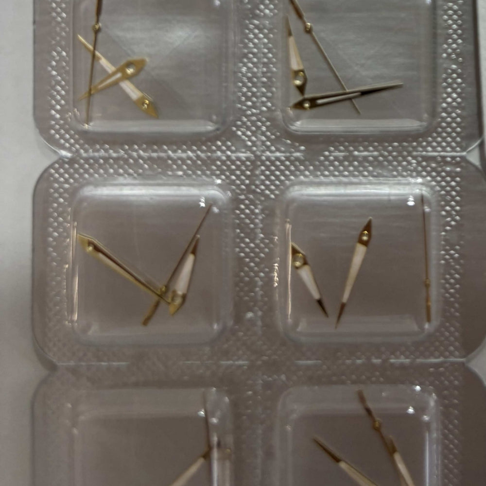 Rose gold watch hands for ETA255.111 and ETA255.112 movements, precise fit and elegant design.