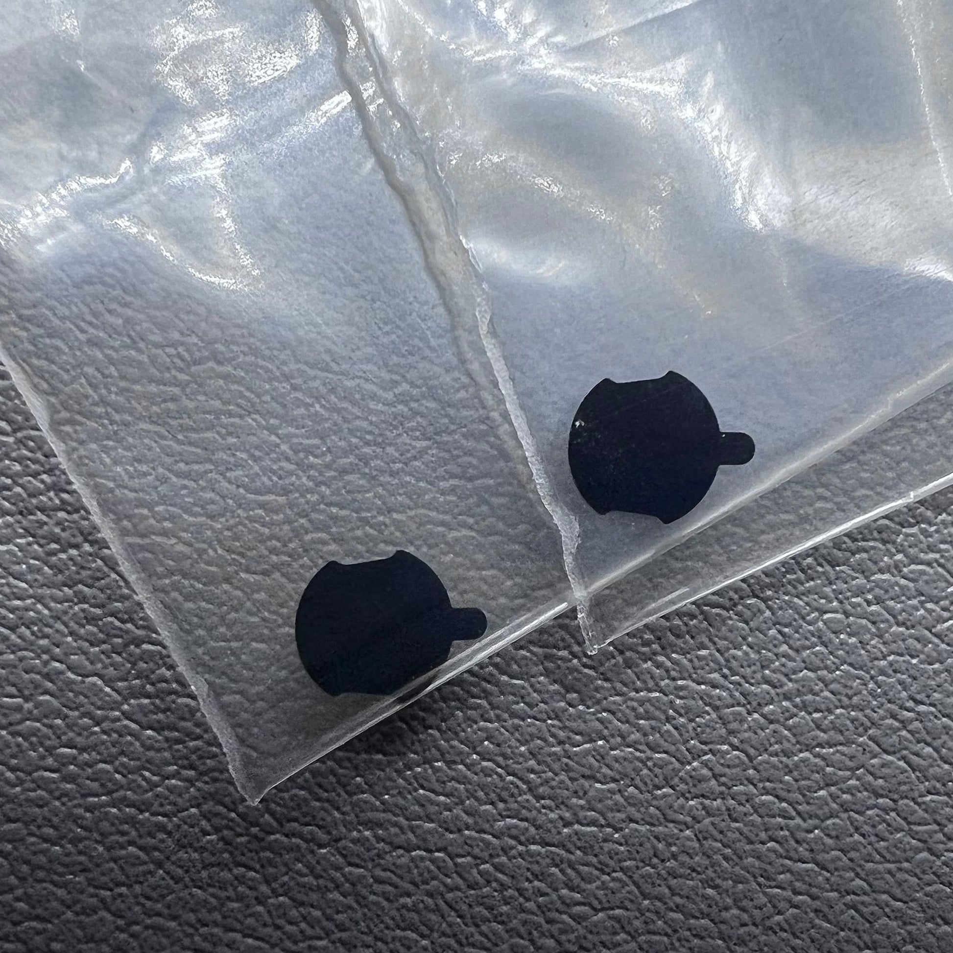 Set of 2 electronic insulation sheets designed for Omega 1456 watch movement, ensuring protection and durability.