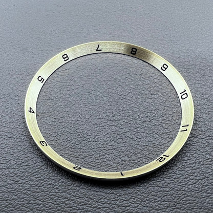 Golden stainless steel chapter ring for watches, 34.9x31.0x1.9mm, durable accessory.