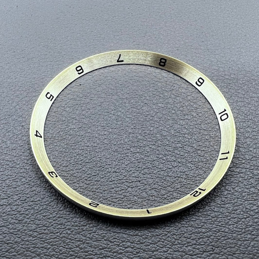 Golden stainless steel chapter ring for watches, 34.9x31.0x1.9mm, durable accessory.