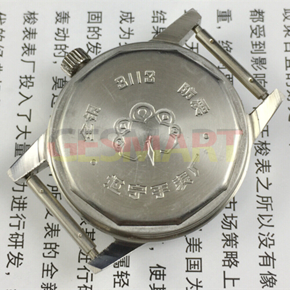 33mm Dandong manual mechanical watch with silver dial, golden markers, and 17 jewels for precise timekeeping.