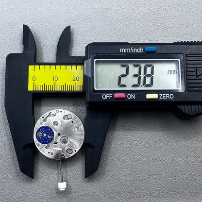 Swiss ISA 9231 Quartz watch movement with star moon phase display at 6 o'clock, precision craftsmanship.