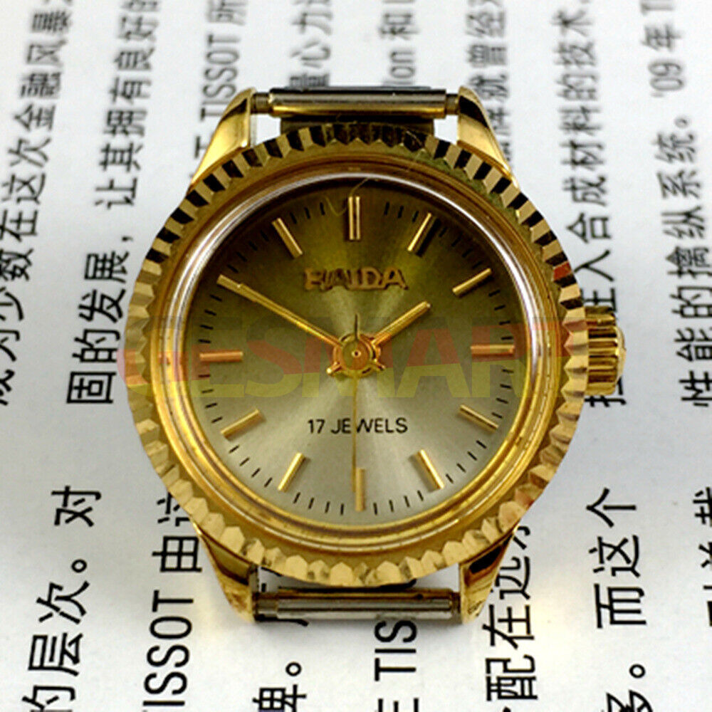 Shanghai Haida 24mm lady watch with golden nail markers and manual mechanical movement.