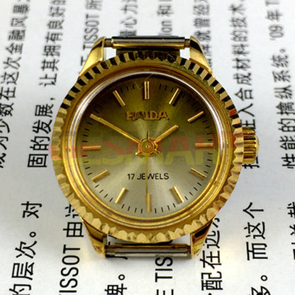 Shanghai Haida 24mm lady watch with golden nail markers and manual mechanical movement.