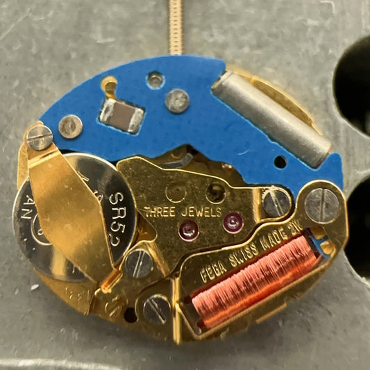 Swiss Made ETA980.003 quartz watch part with blue circuit board for precise timekeeping repairs