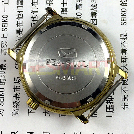35mm golden case Tianjin Seagull watch with round dial, manual mechanical movement, classic design.