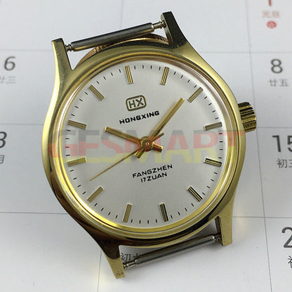 33mm Chinese manual mechanical watch with golden nails, silver dial, round golden case.