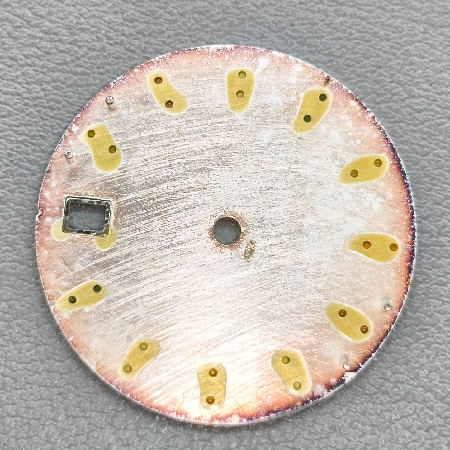 watch dial with S logo