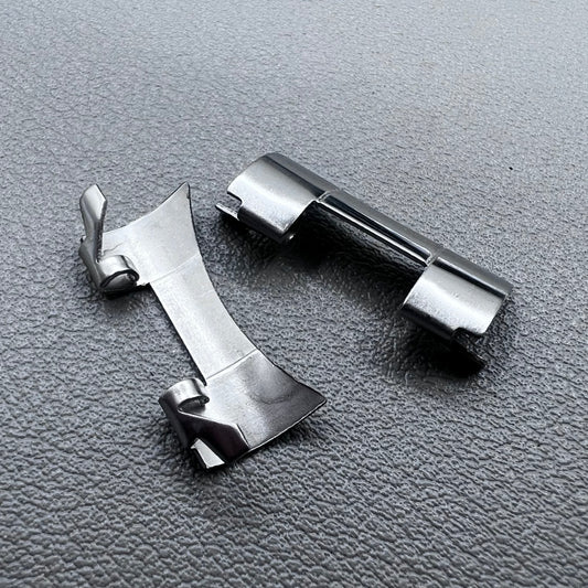 Set of 2 stainless steel 20x9mm curved end links and spring bars for watch bands, compatible with various straps.