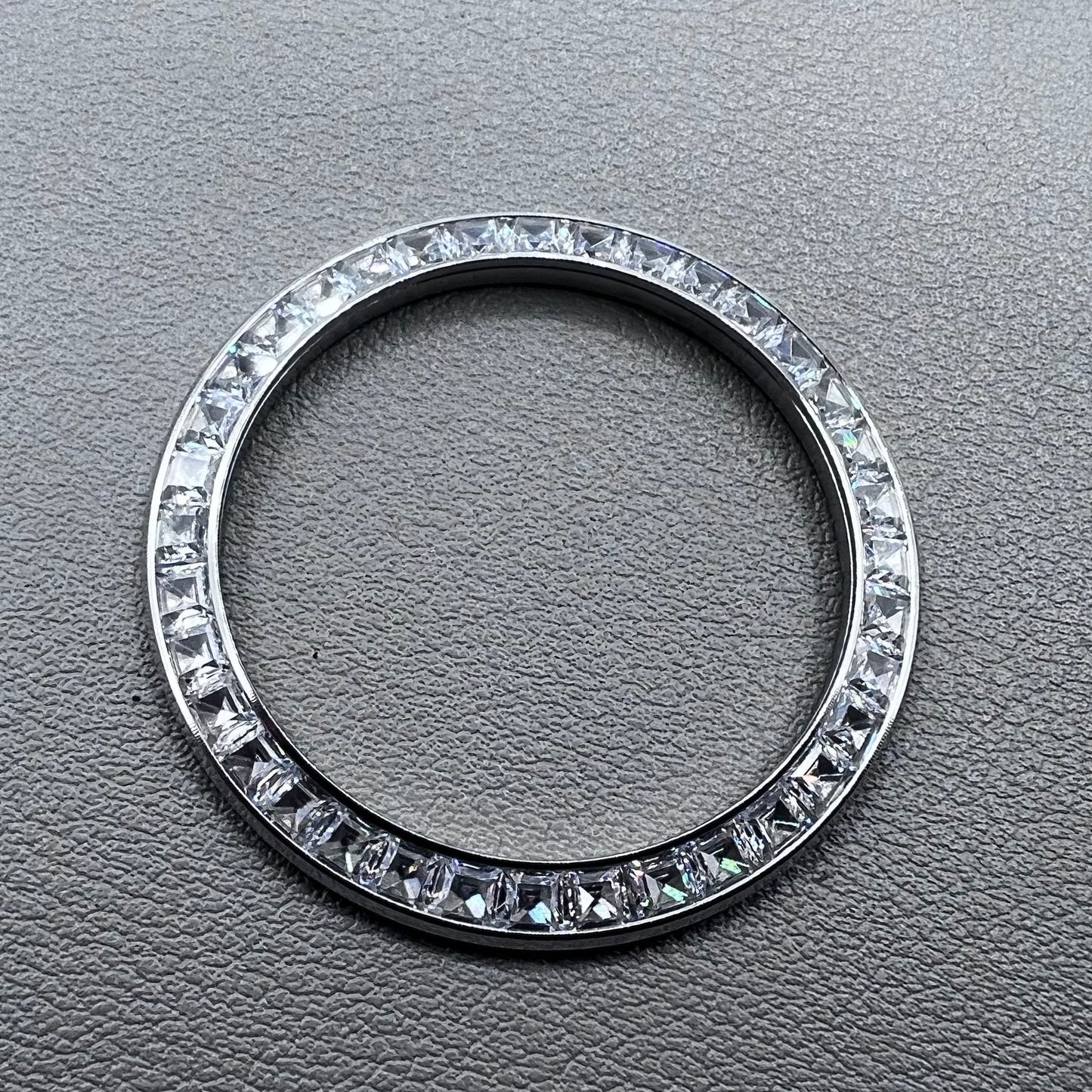 Silver 39.4mm Daytona watch bezel with T-shaped square diamond moissanite, flat bottom design.