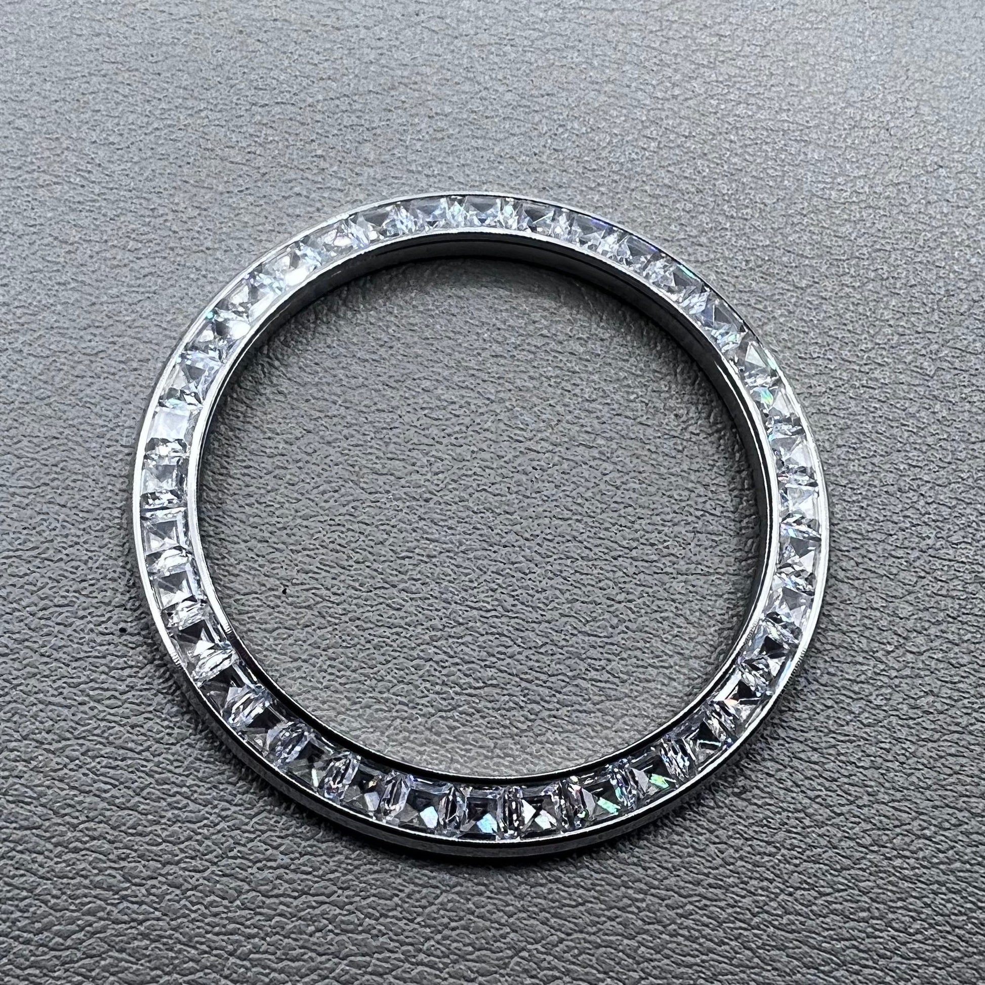 Silver 39.4mm Daytona watch bezel with T-shaped square diamond moissanite, flat bottom design.
