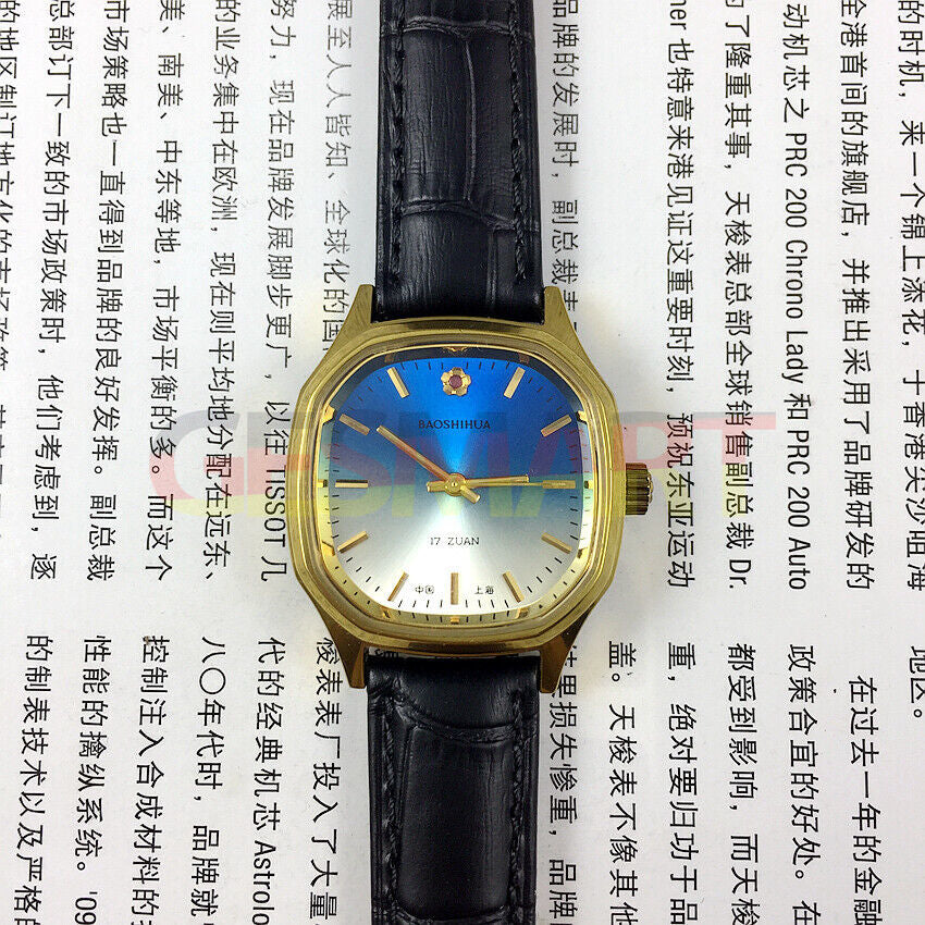33mm Shanghai manual mechanical watch with blue dial, square case, and gold markers by Shanghai.