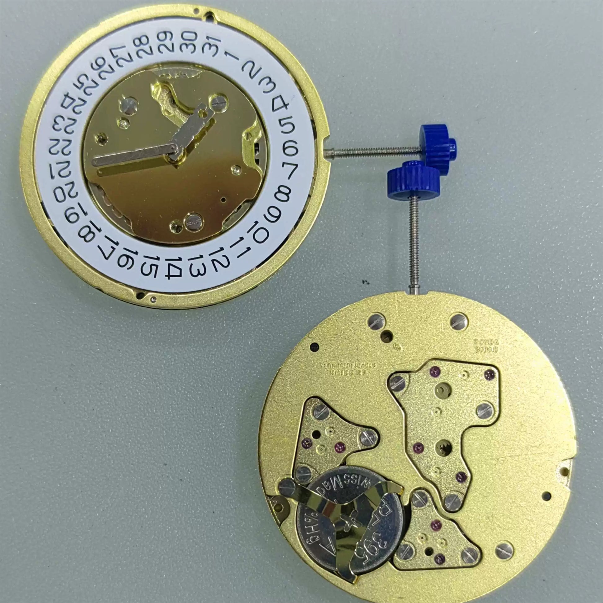 Swiss Made Ronda 5030.D quartz watch movement with date display at 3 o'clock, white disk design.