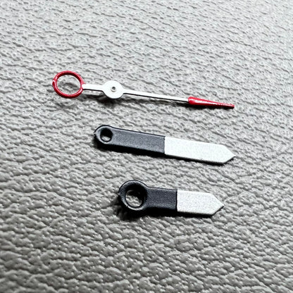 Set of black and white painted trim arrow-shaped watch hands without lume for Ronda 515, ideal for precise timekeeping.