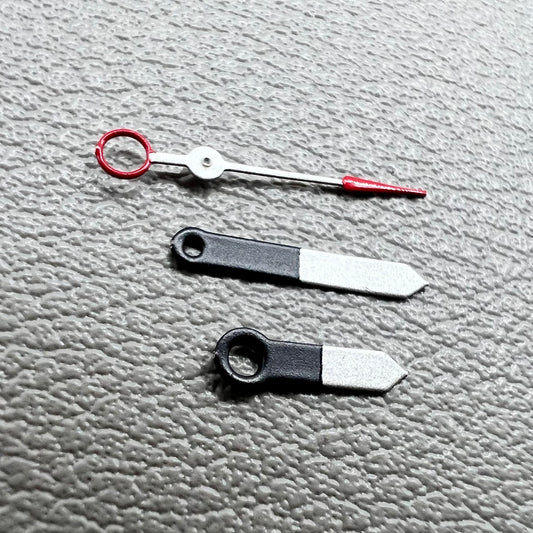 Set of black and white painted trim arrow-shaped watch hands without lume for Ronda 515, ideal for precise timekeeping.