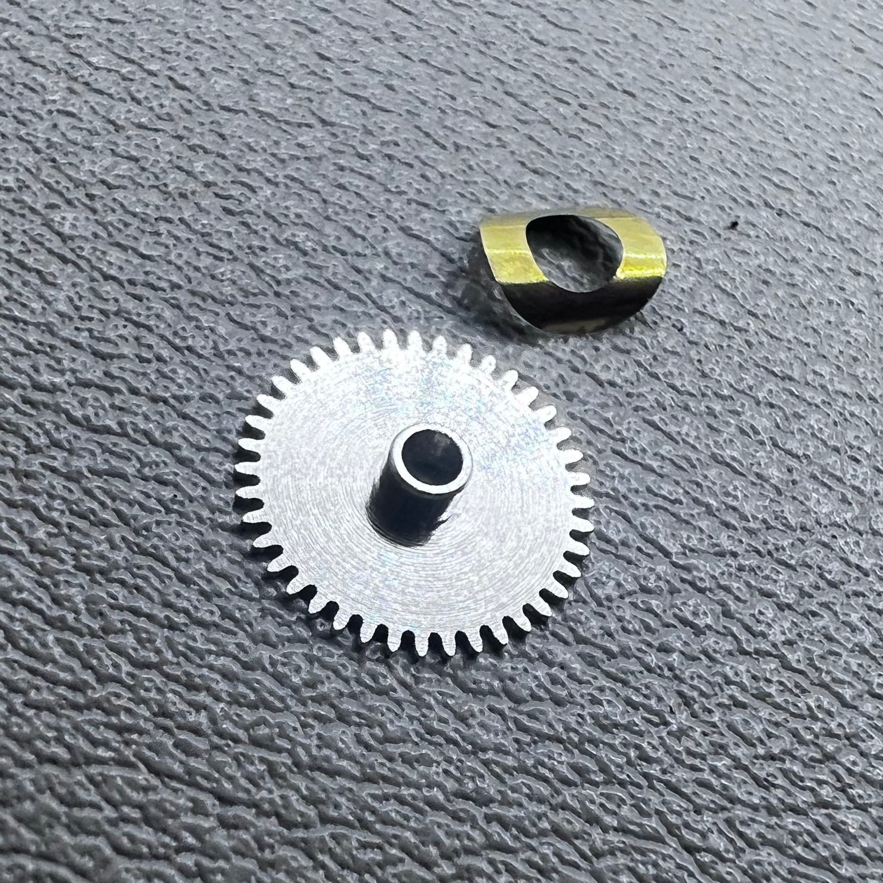 Set of 3 train bridge and hour wheel components for Seagull ST3600 and ETA6497 watch movements.