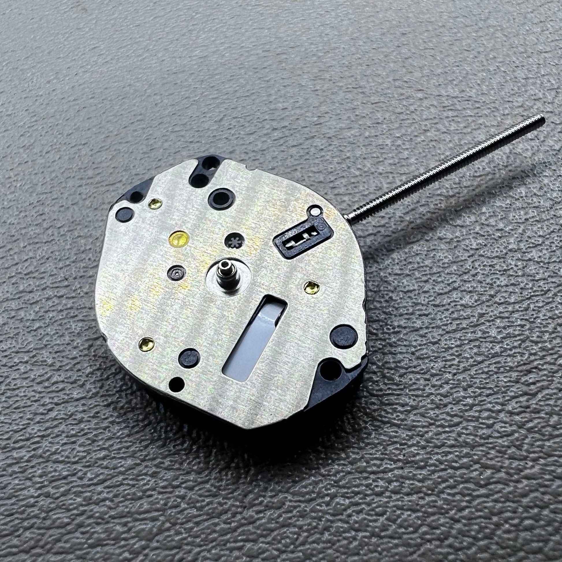 Japan Hattori Epson TMI AL35E quartz watch movement, precise timekeeping for repair and replacement.