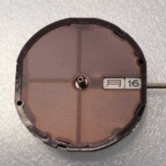 Citizen E001M Eco-Drive quartz watch movement showing day-date solar-powered mechanism for accessories.