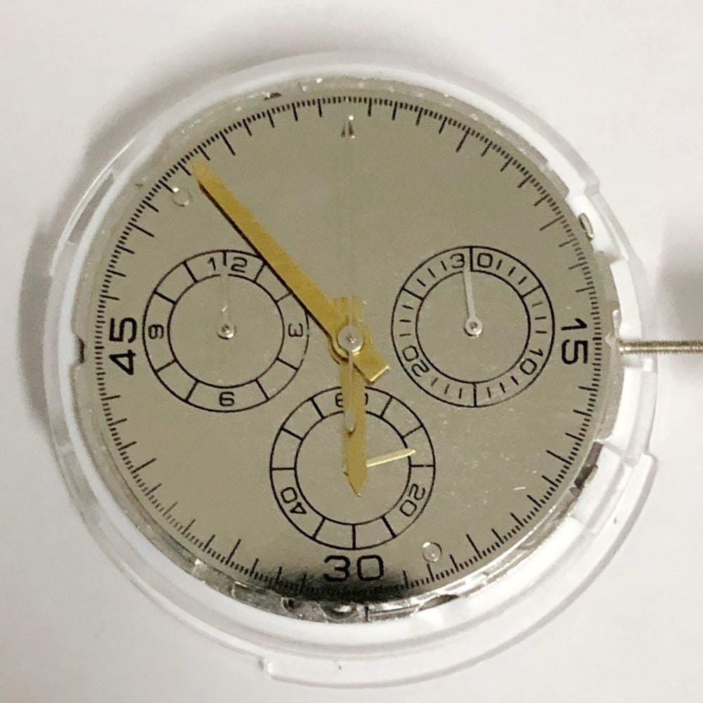 Shanghai 4130 automatic watch with small second hand at 3, 6, and 9 o'clock positions, China-made precision.