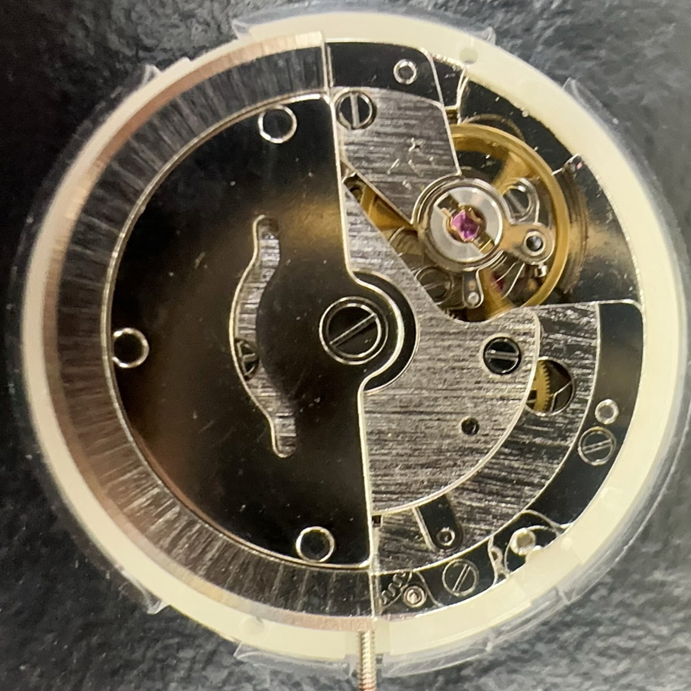 Tianjin ST16 T16 gold disk watch with automatic mechanical movement and double calendar feature.