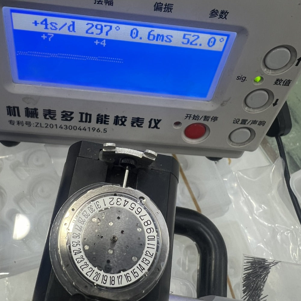 Miyota 9130 automatic mechanical watch movement with date display at 6 o'clock, precision engineering.