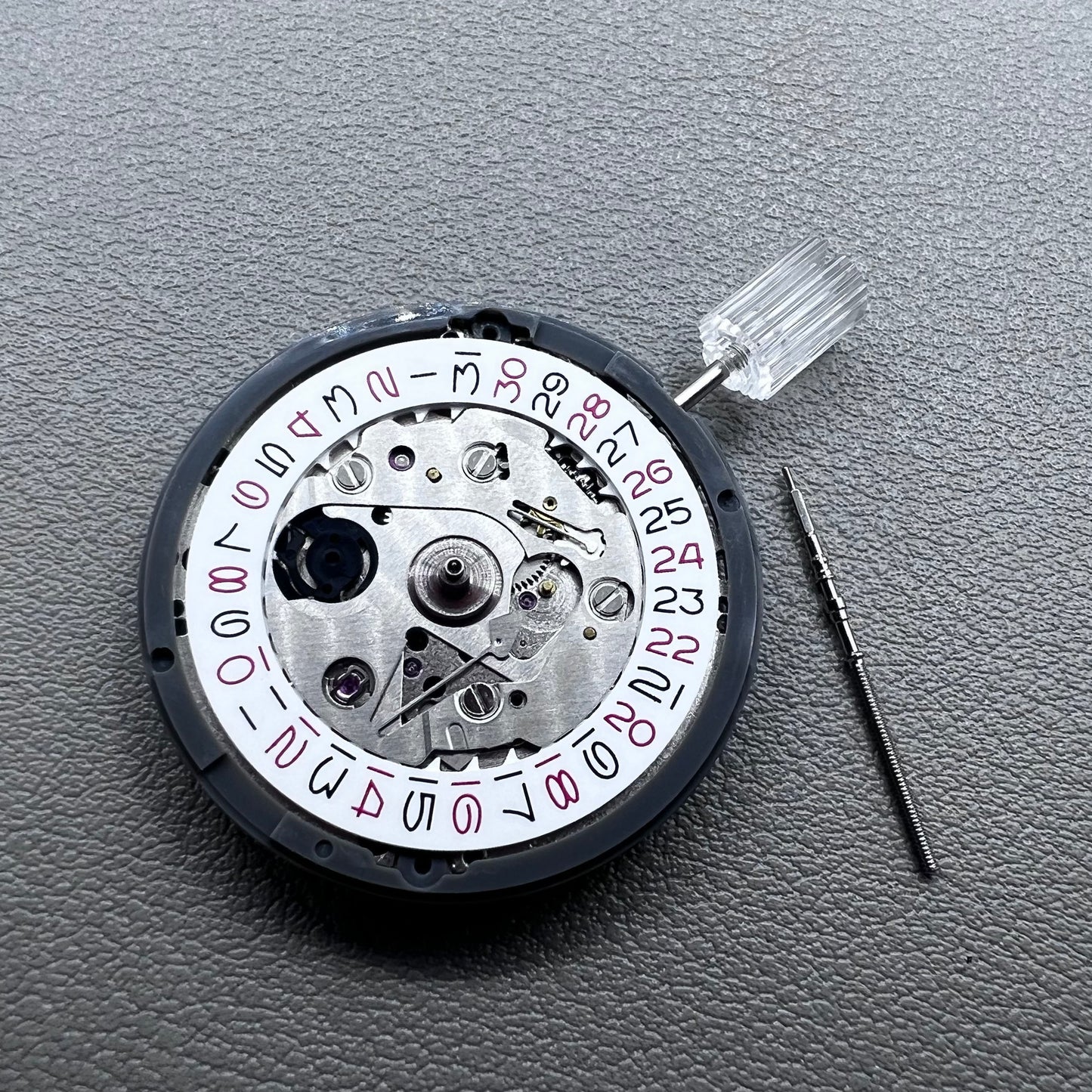 Seiko NH35 watch accessory showcasing red even number dial with high-accuracy automatic mechanical movement.