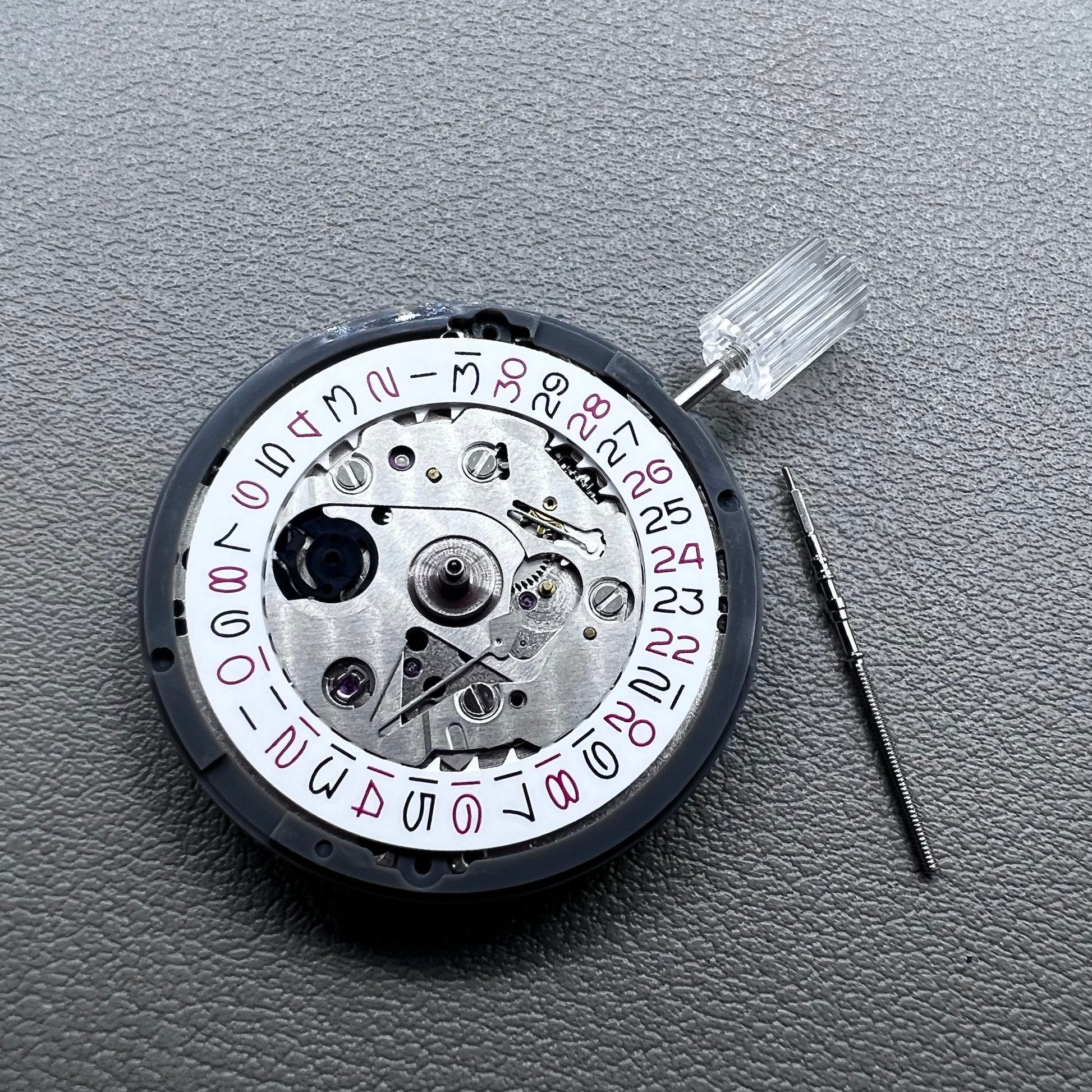 Seiko NH35 watch accessory showcasing red even number dial with high-accuracy automatic mechanical movement.