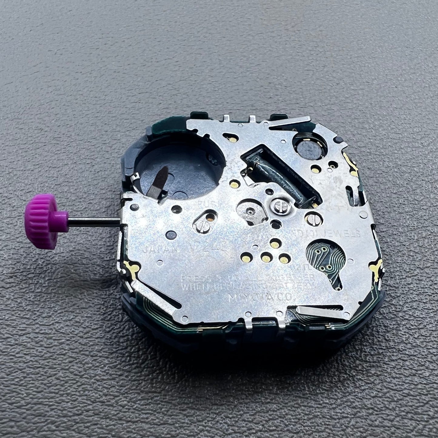 Japan T240 quartz watch movement with 3 hands and digital display, perfect for precise timekeeping accessories.