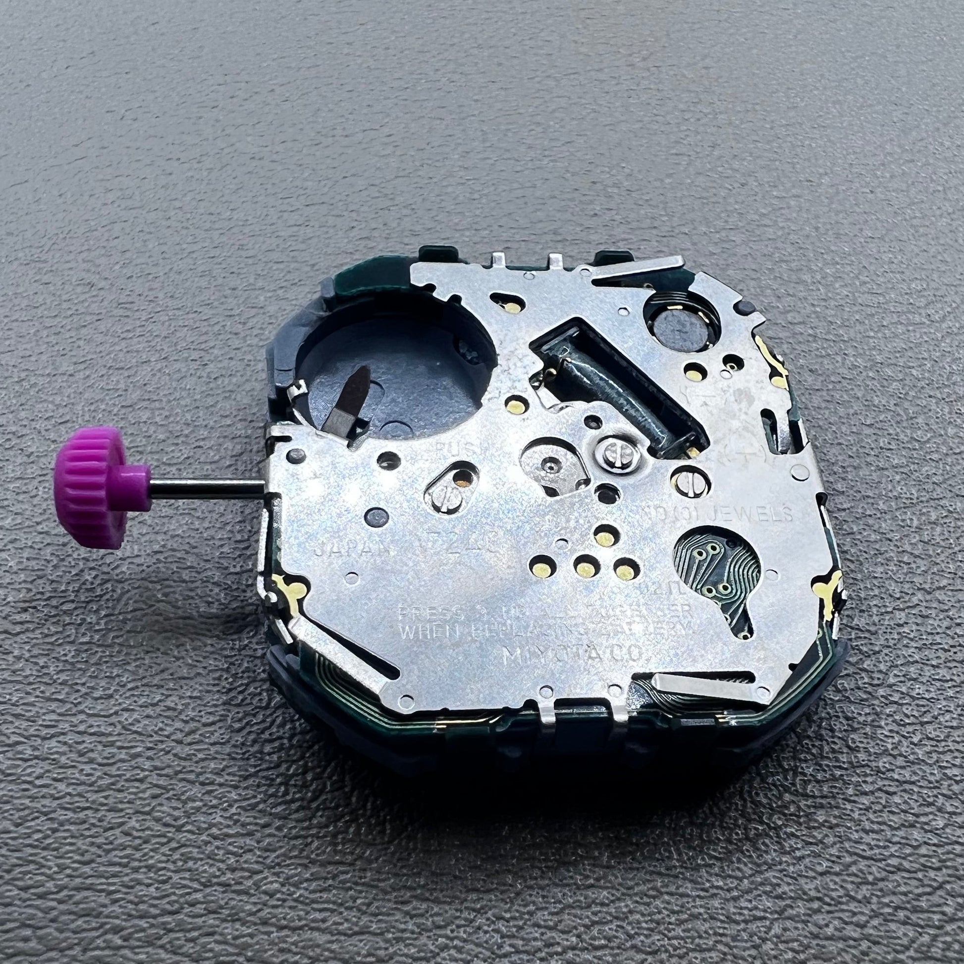 Japan T240 quartz watch movement with 3 hands and digital display, perfect for precise timekeeping accessories.
