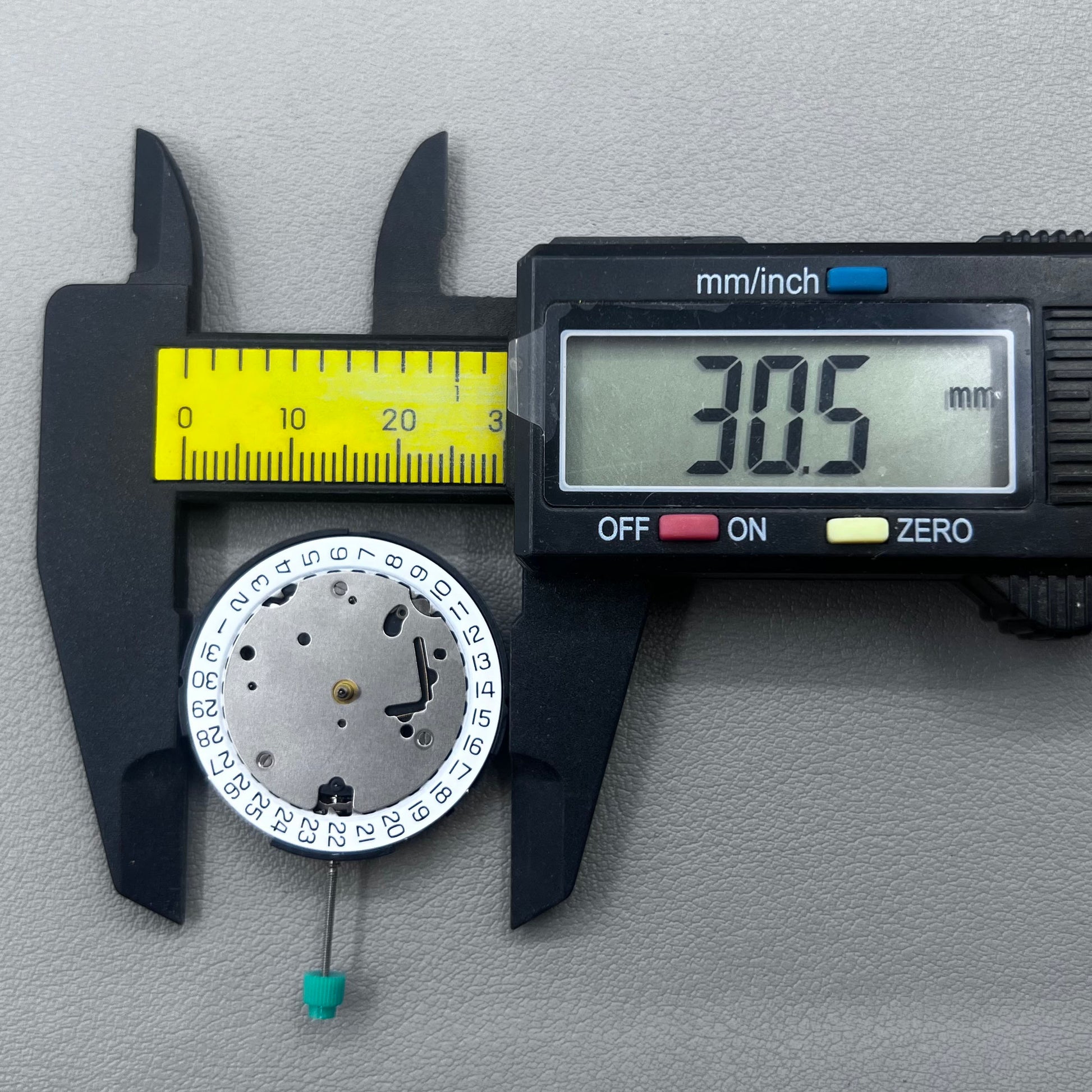 Swiss ISA 8371C quartz movement by ISA, multifunctional watch mechanism for precise timekeeping.