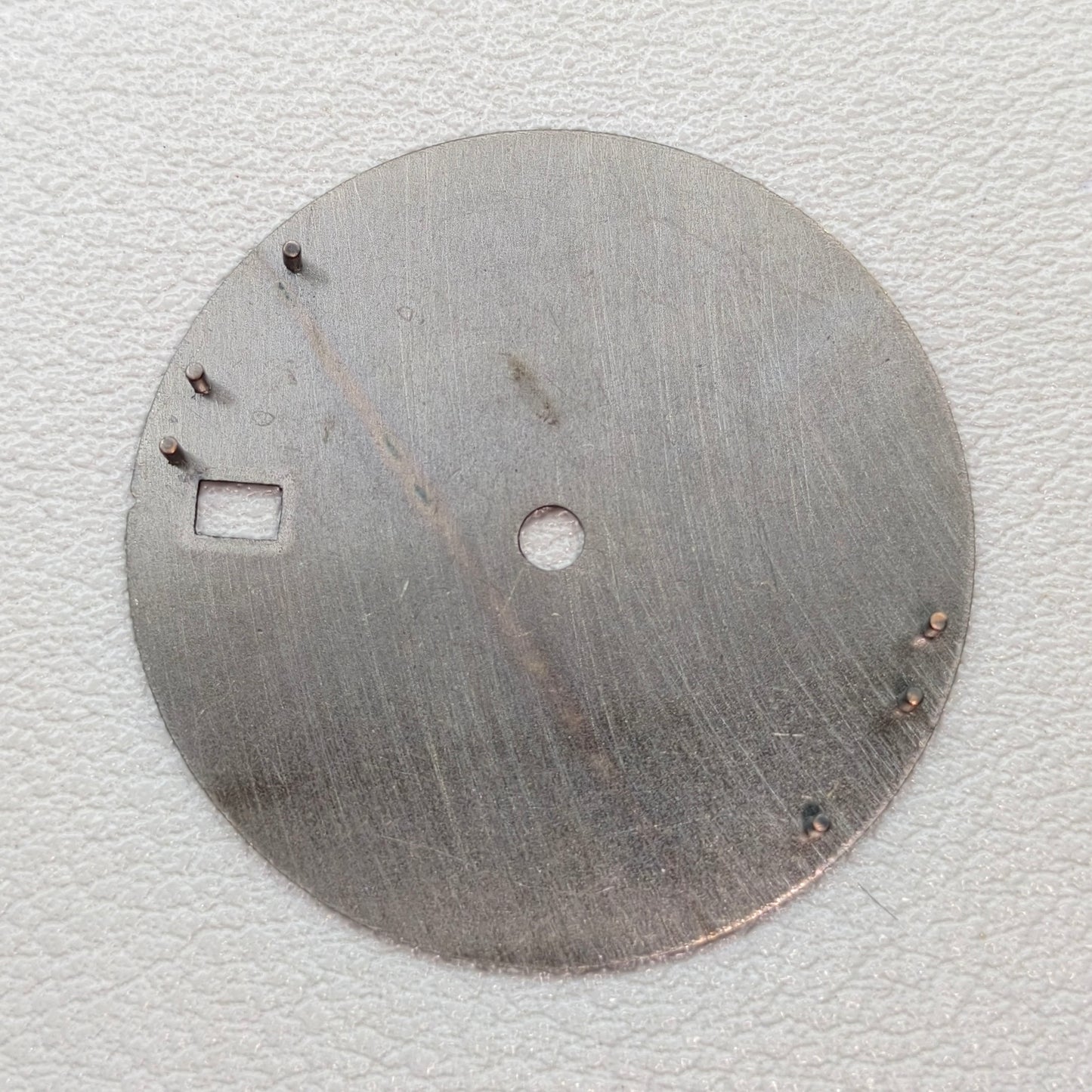 watch dial with S logo