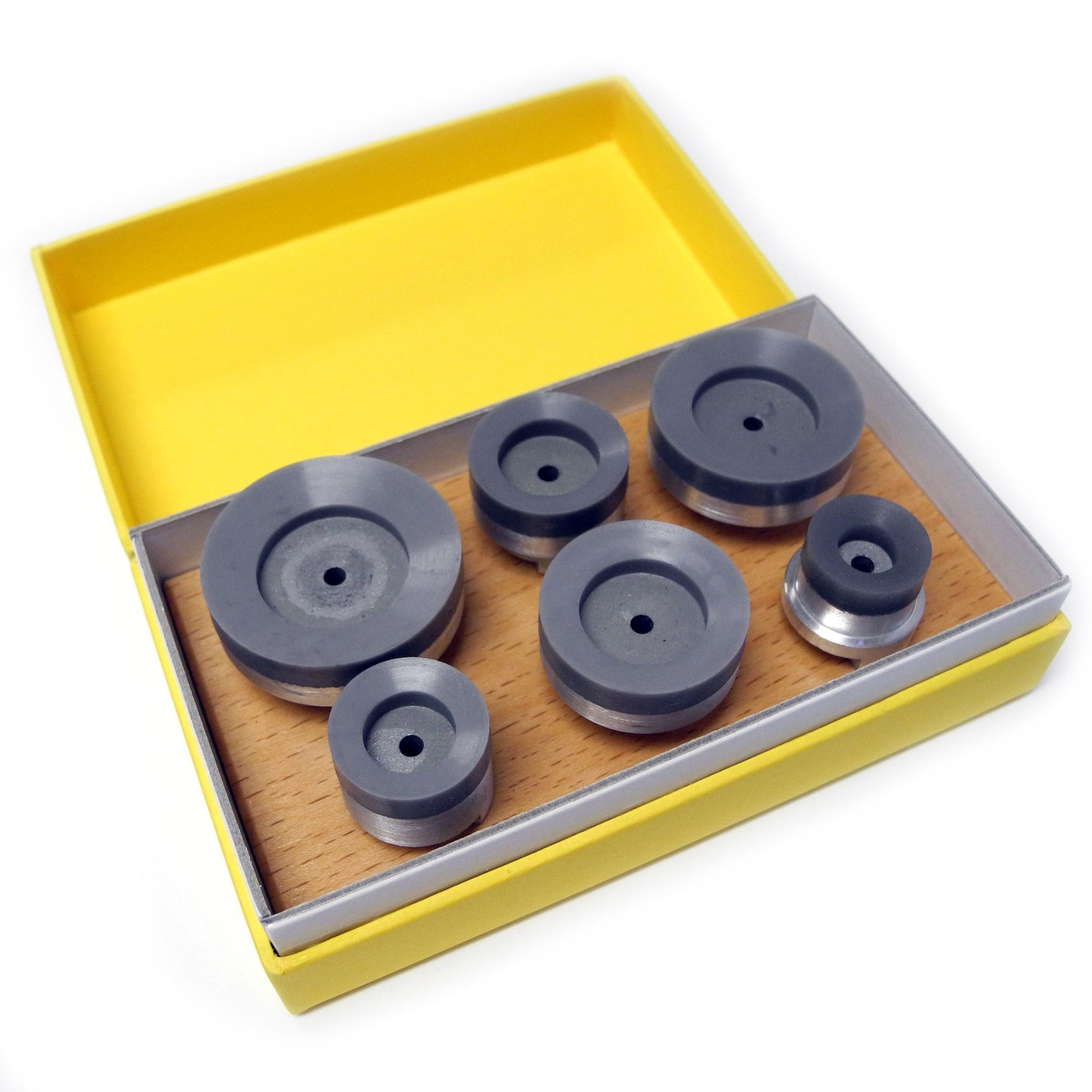 Bergeon suction upper dies set of 6 round heads in Adiprene for watch repair precision.