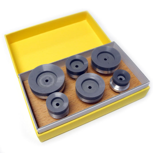 Bergeon suction upper dies set of 6 round heads in Adiprene for watch repair precision.