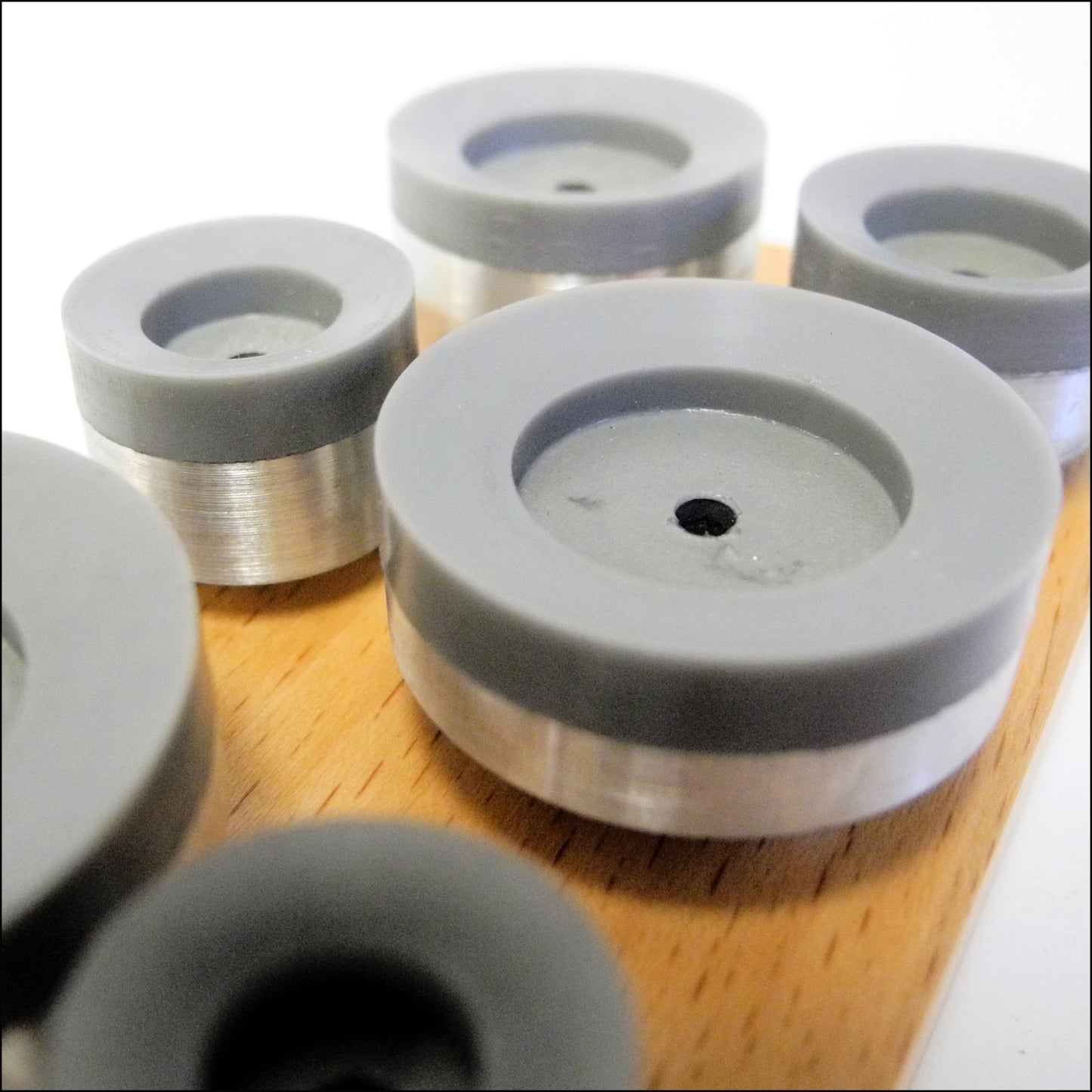 Bergeon set of 6 round Adiprene suction upper dies for precise watch repair.