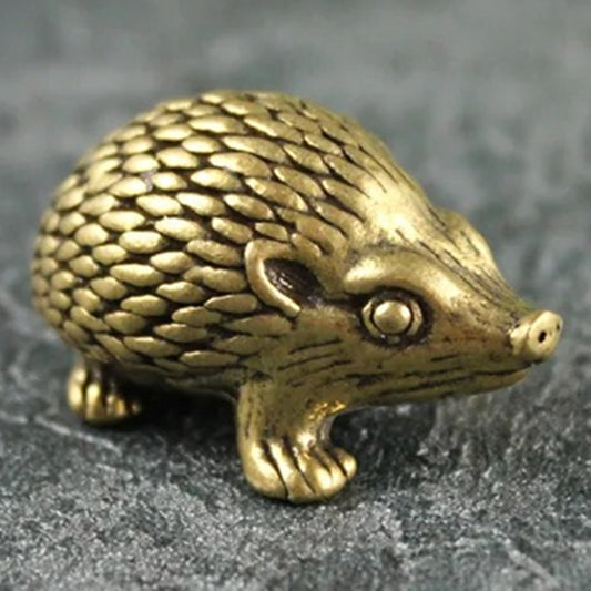 Solid copper hedgehog trinket with vintage bronze finish, hand-carved details.