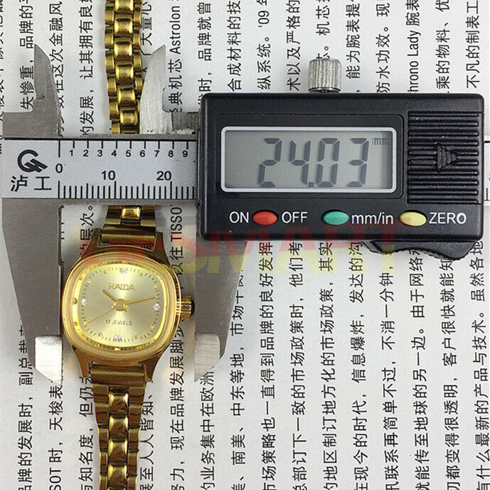24mm SHANGHAI HAIDA lady watch featuring golden nails and champagne dial, manual mechanical movement.