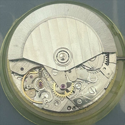 Dandong 7750 mechanical watch movement showing small seconds at 6 and 9 with date at 3 for accuracy.