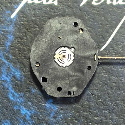 Swiss ETA802.105 quartz watch part showing 3-hand movement without calendar, ideal for precise repairs.