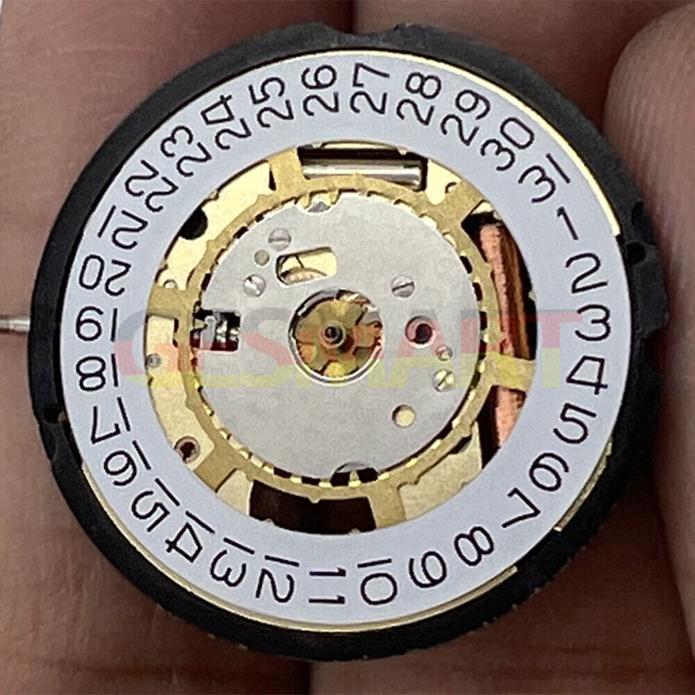 Swiss Made Ronda 715 quartz watch movement with date feature, golden tone for precise timekeeping.