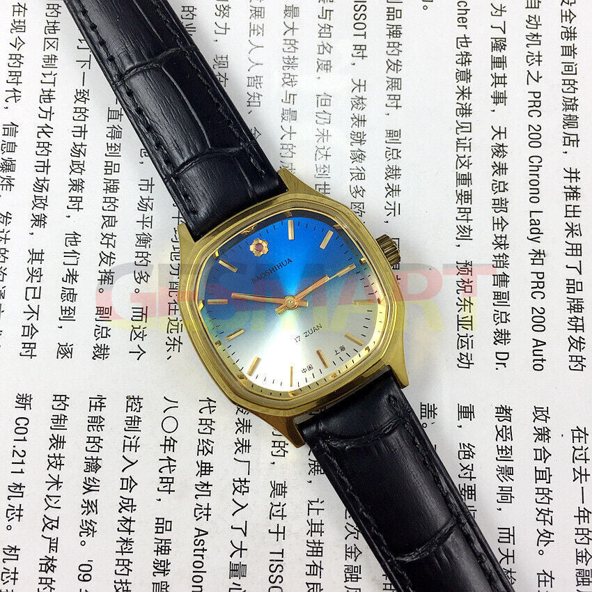 33mm Shanghai manual mechanical watch with blue dial, square case, and golden nail markers, 17 jewels.