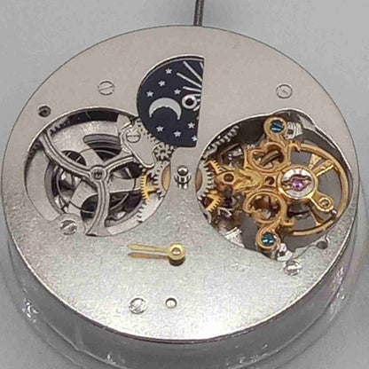 Silver mechanical watch accessory with hollow movement and large 12 o'clock flywheel by China Made.