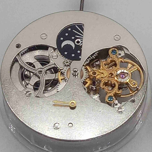 Silver mechanical watch accessory with hollow movement and large 12 o'clock flywheel by China Made.