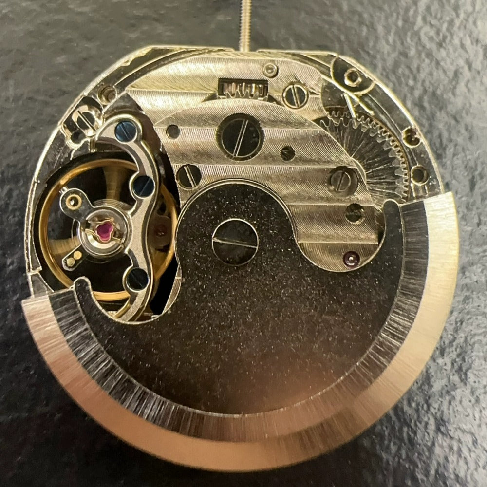 Liaocheng F8031 watch with 3 hands, automatic movement, and moonphase display at 2 o'clock position
