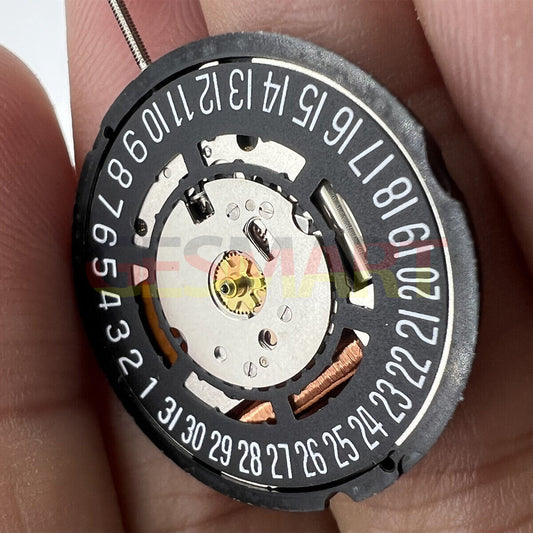Swiss Part Ronda 715 quartz watch movement with black date wheel and date at 6 o'clock position.