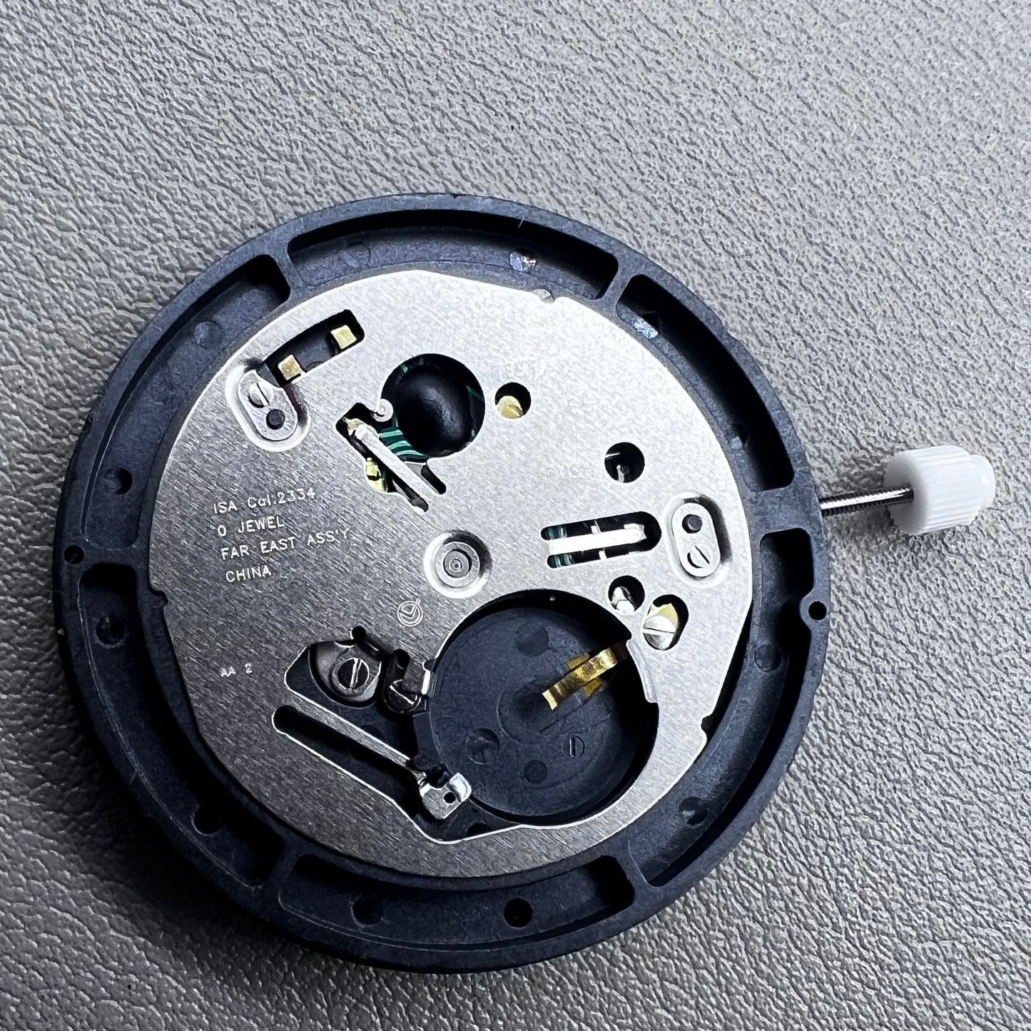 Swiss ISA 2334 quartz watch movement with date at 3 o?clock, precise timekeeping by Swiss ISA.