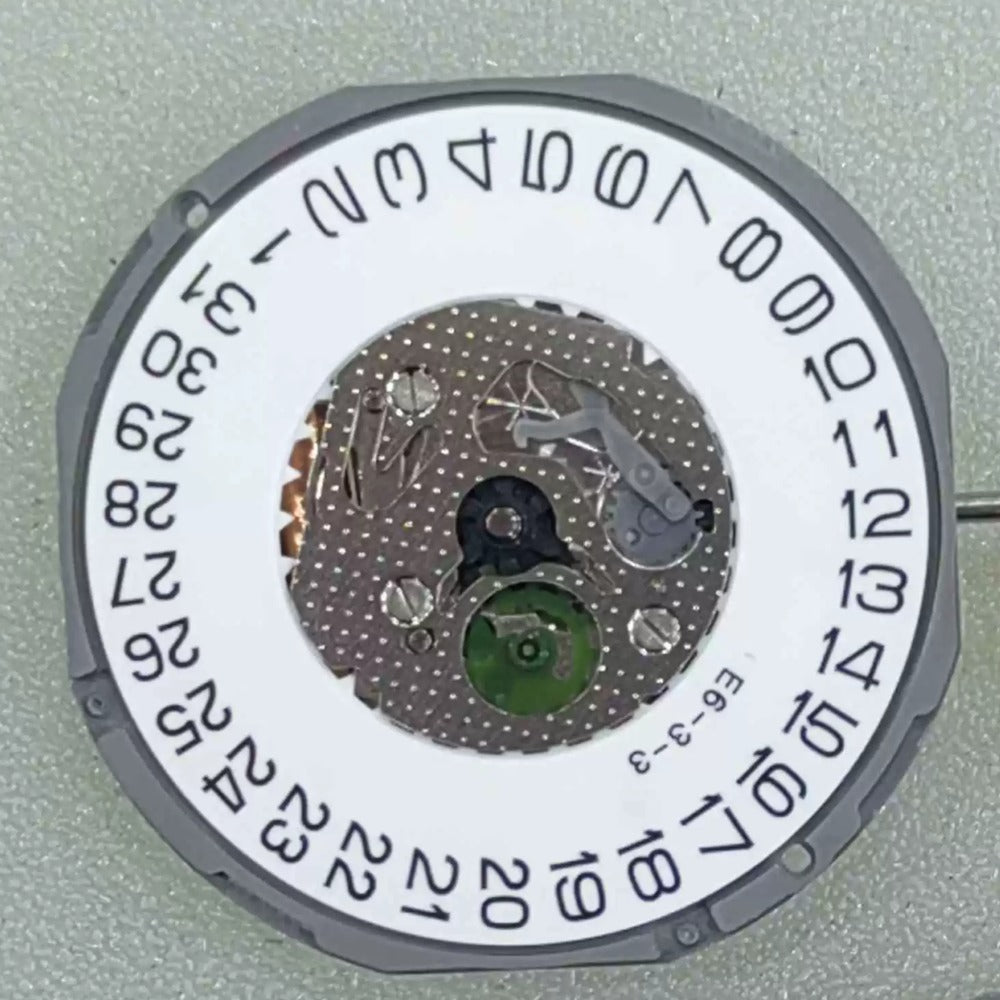 Japan-made Miyota 1M15 quartz watch movement with 2 hands and date window at 3 o'clock for precise timekeeping.