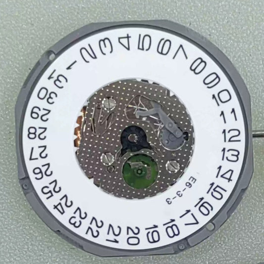 Japan-made Miyota 1M15 quartz watch movement with 2 hands and date window at 3 o'clock for precise timekeeping.