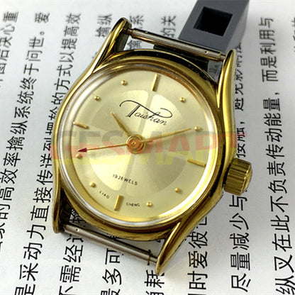 TAISHAN ladies manual mechanical watch with 19 jewels, champagne dial, golden case, elegant style.